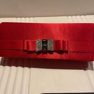 Elegant Red Clutch with Bow Accent
